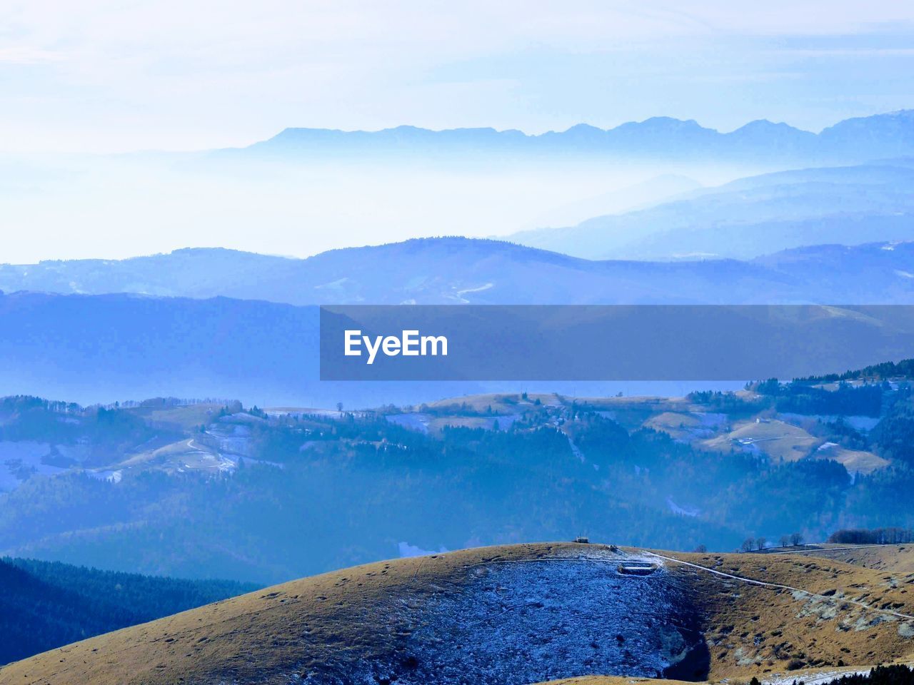 High angle view of mountains against sky