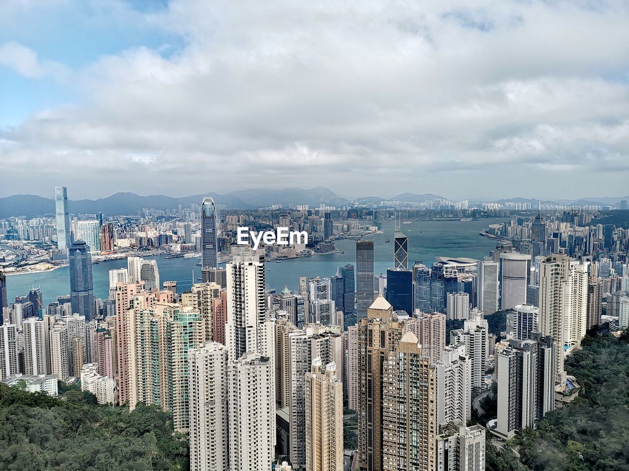 PANORAMIC VIEW OF CITY BUILDINGS AGAINST SKY