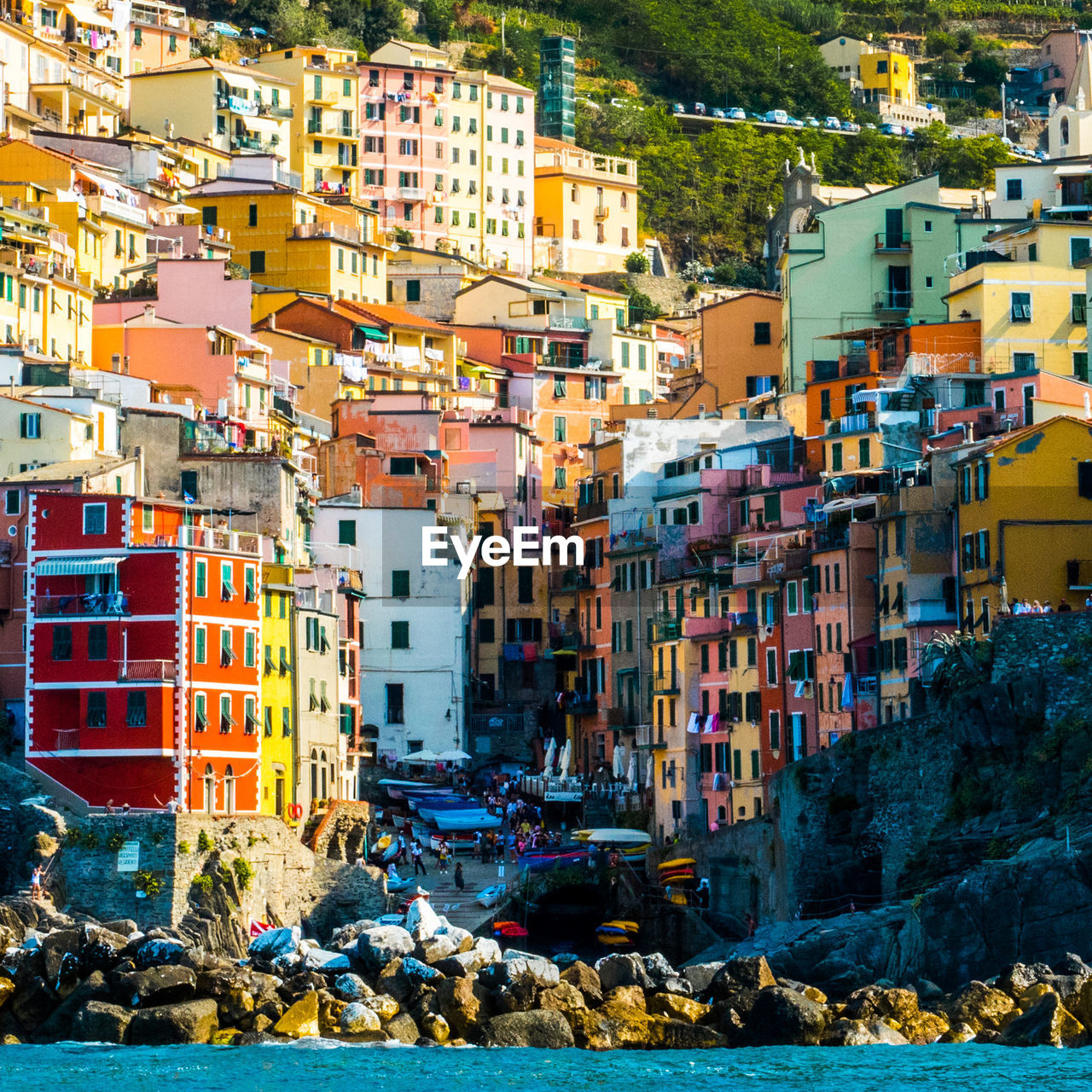 Multi colored residential buildings against sky