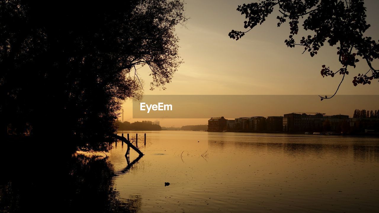 SCENIC VIEW OF RIVER DURING SUNSET