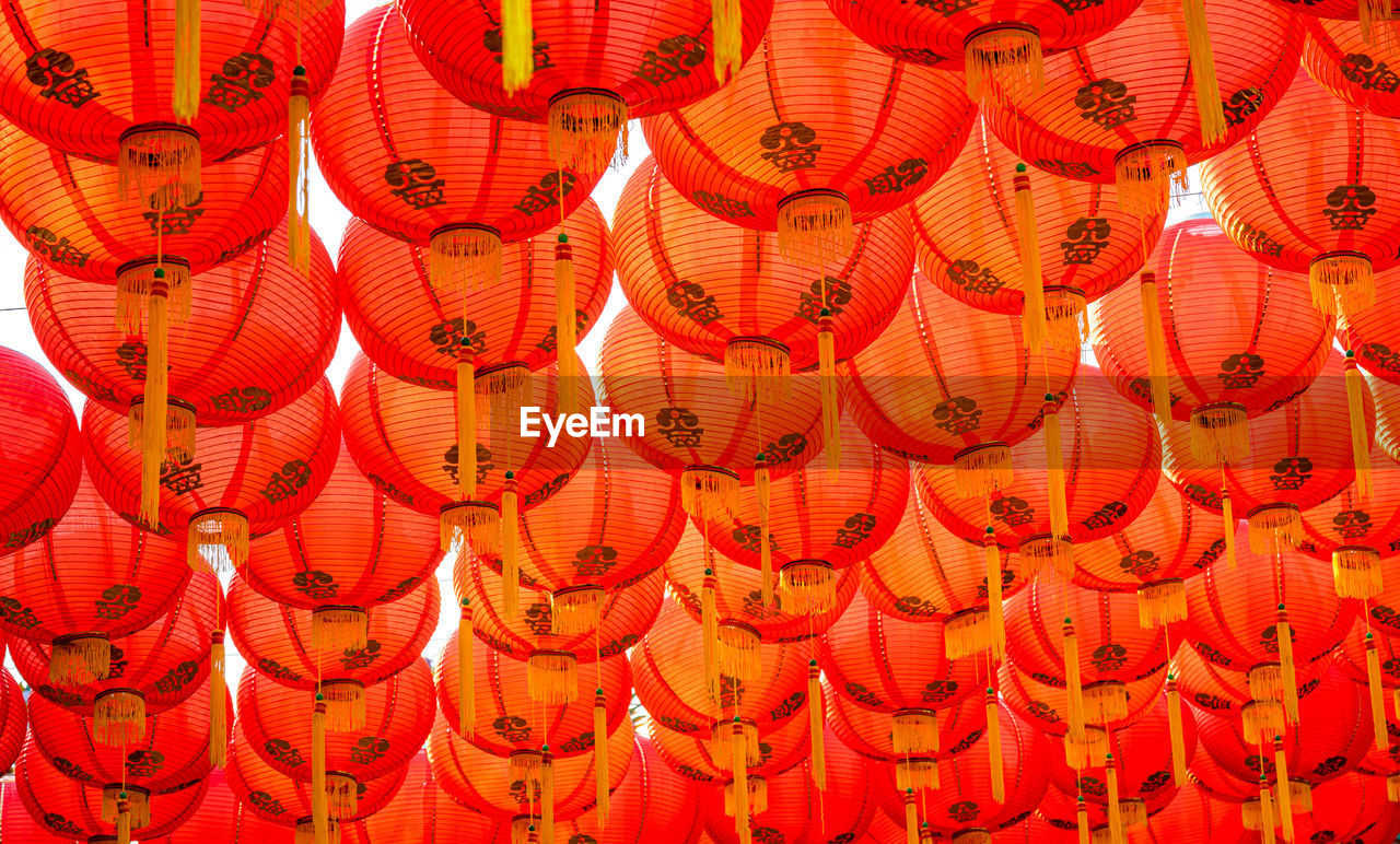 Low angle view of lanterns hanging in row