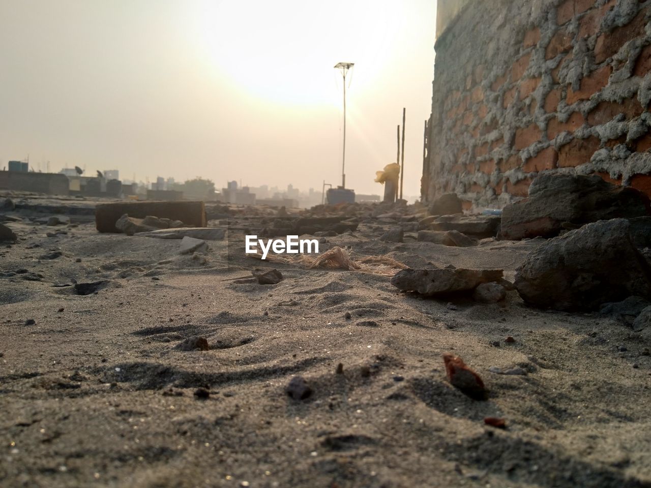 Surface level of street by buildings against sky