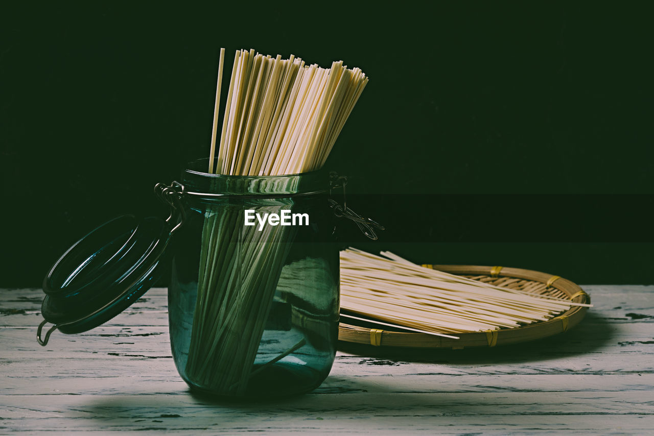 CLOSE-UP OF ROPES ON TABLE