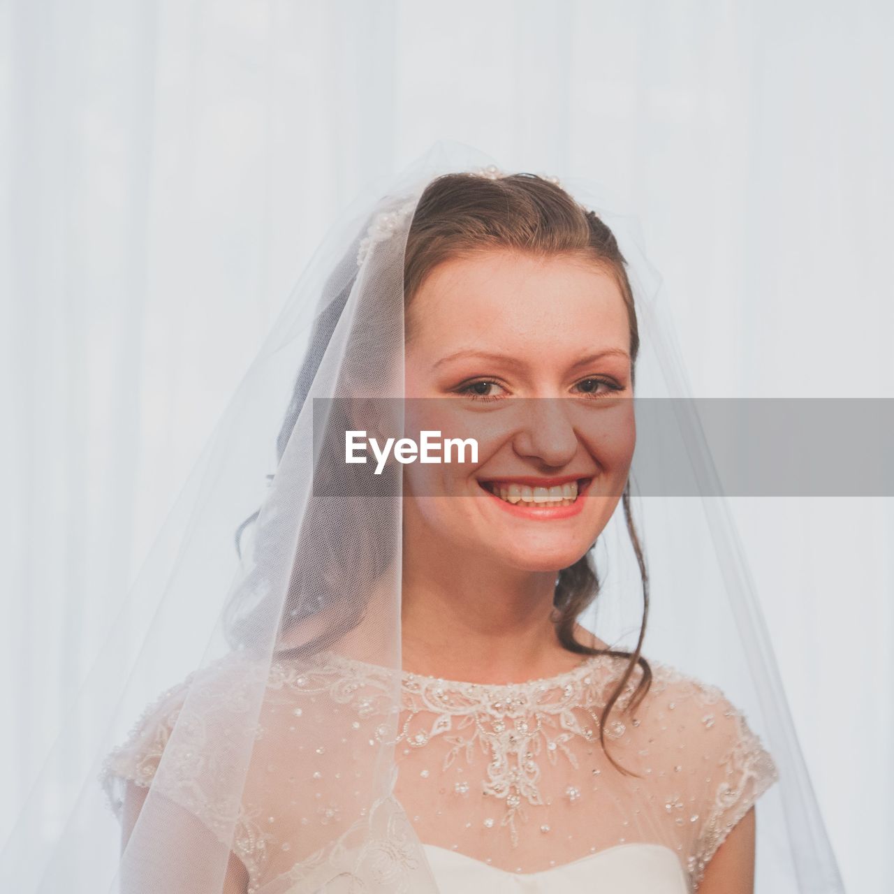 Portrait of a smiling young woman bride wedding celebrate