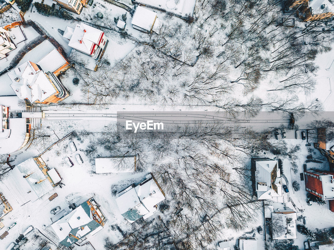 AERIAL VIEW OF HOUSES IN WINTER