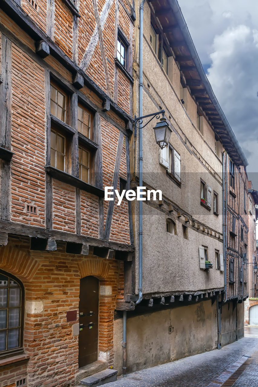 Narrow street in albi historical center, france