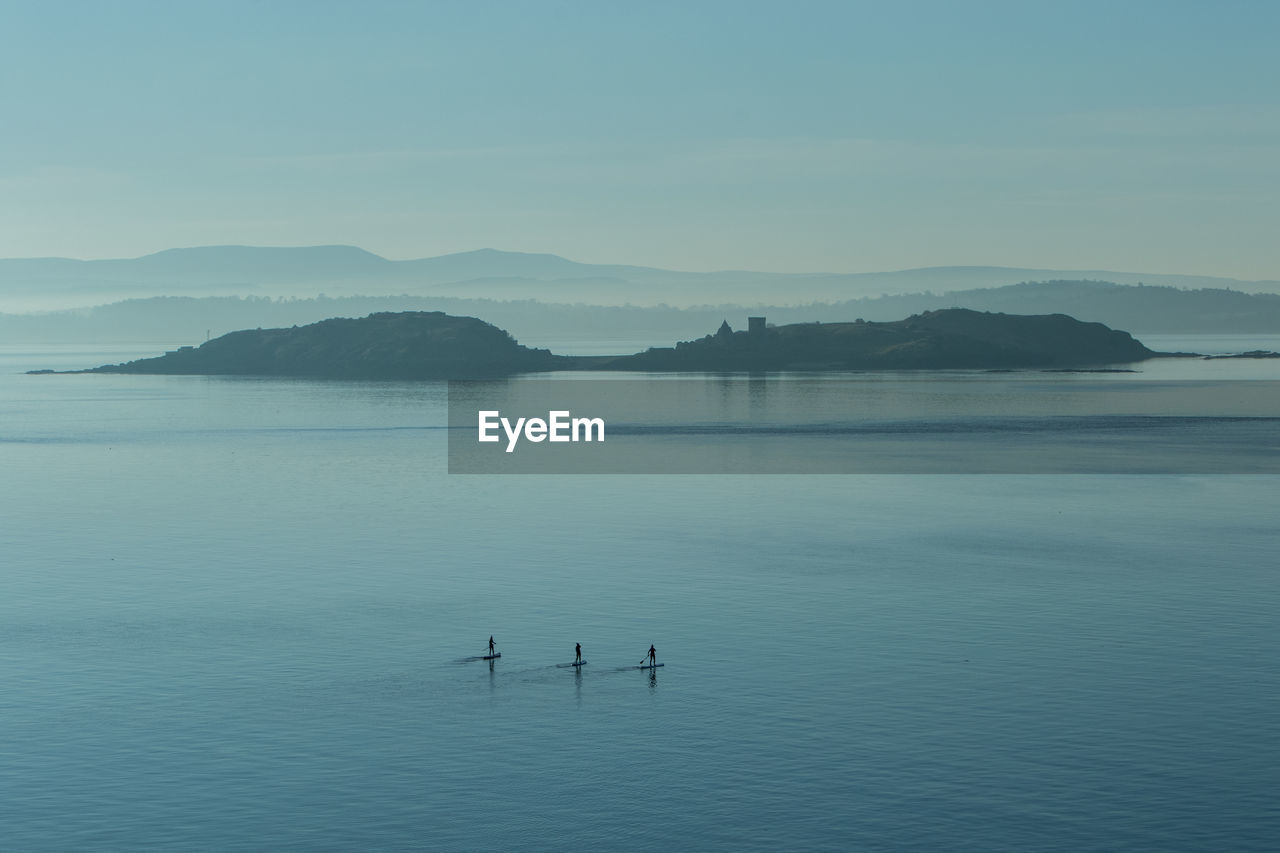 SCENIC VIEW OF LAKE BY MOUNTAINS AGAINST SKY