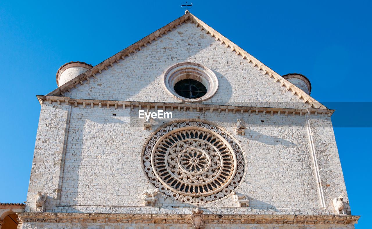 LOW ANGLE VIEW OF BELL TOWER AGAINST CLEAR SKY