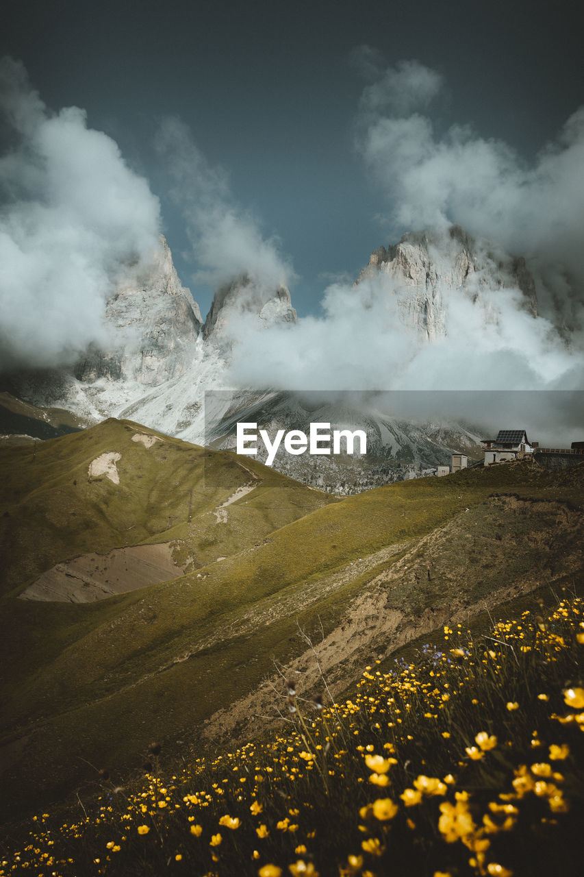 Scenic view of snowcapped mountains against sky