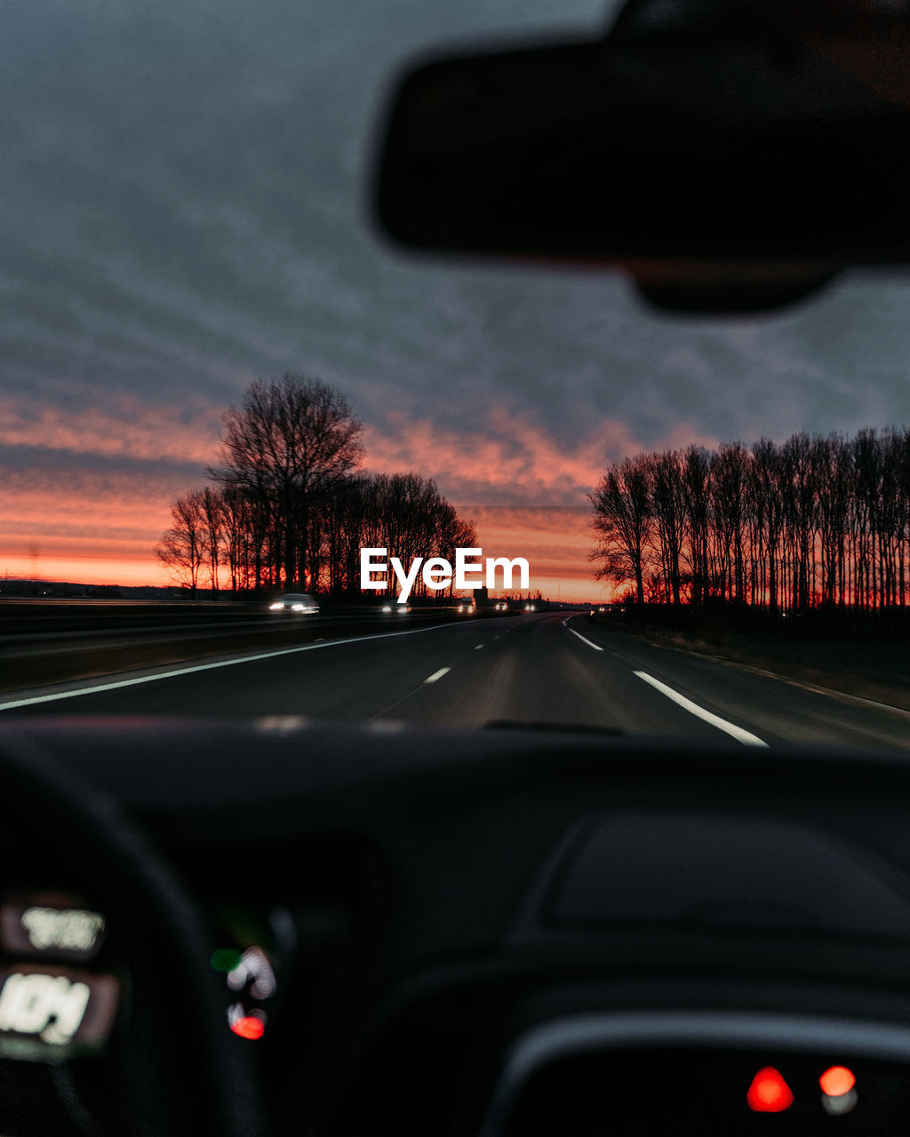 Road seen through car windshield