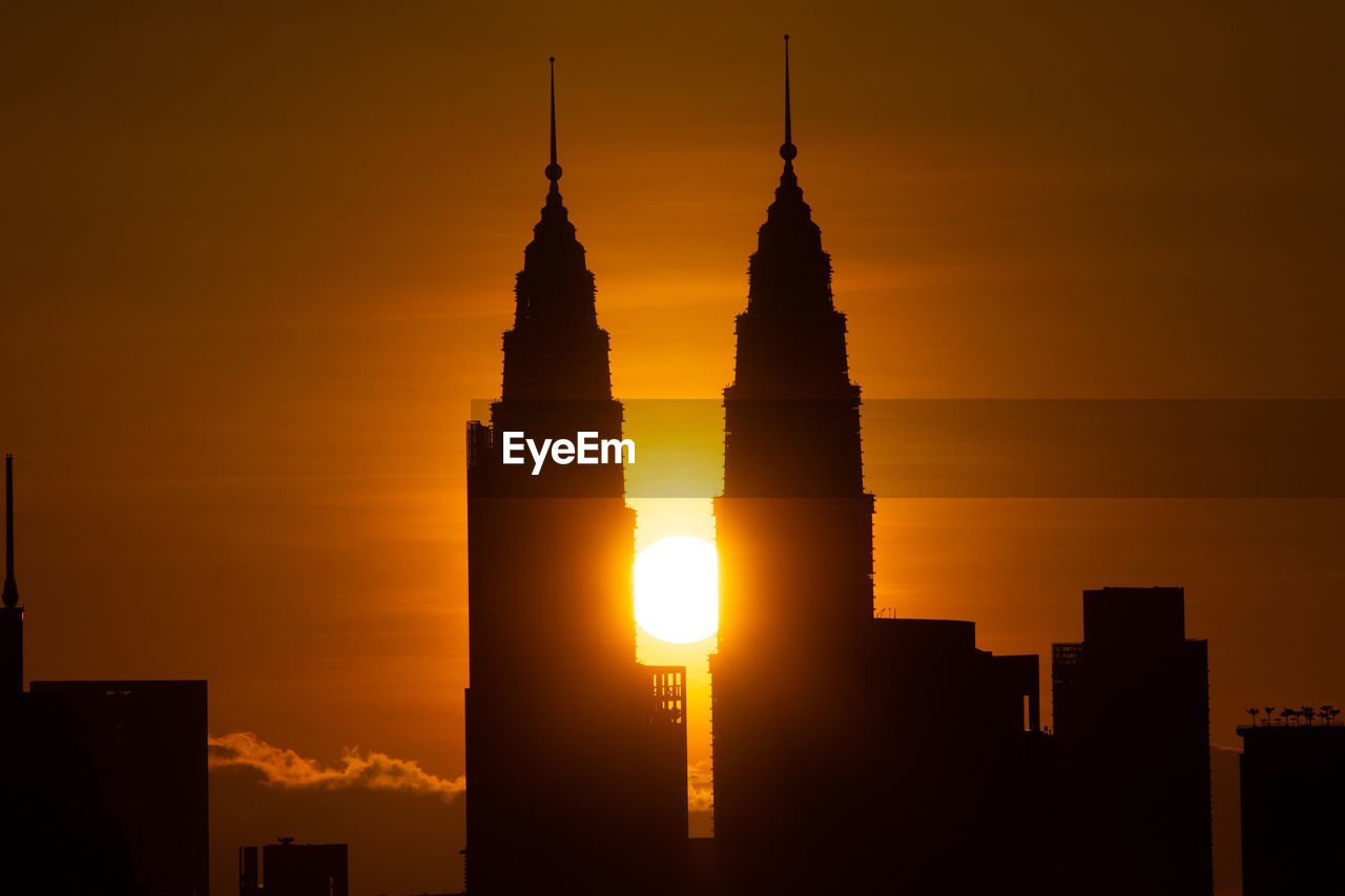 SILHOUETTE OF BUILDING DURING SUNSET