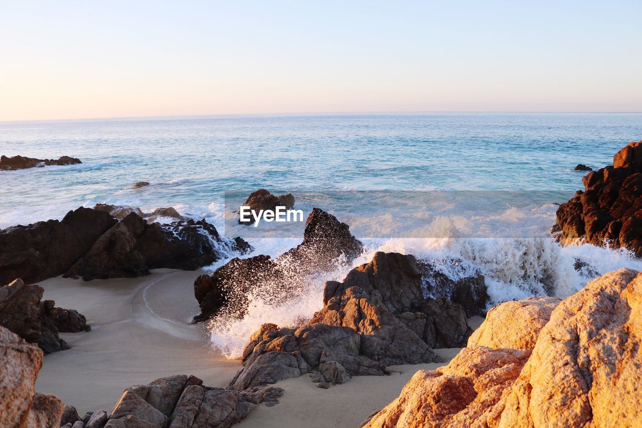 Scenic view of sea against clear sky