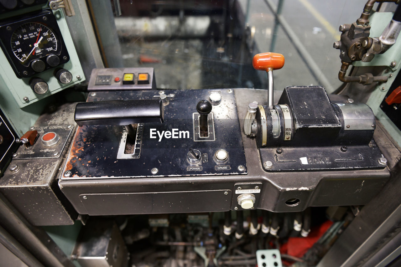 CLOSE-UP OF MACHINE PART IN KITCHEN