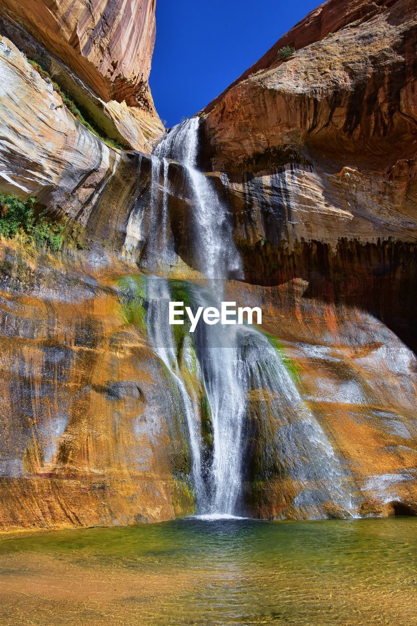 Lower calf creek falls waterfall colorful grand staircase escalante national monument boulder utah