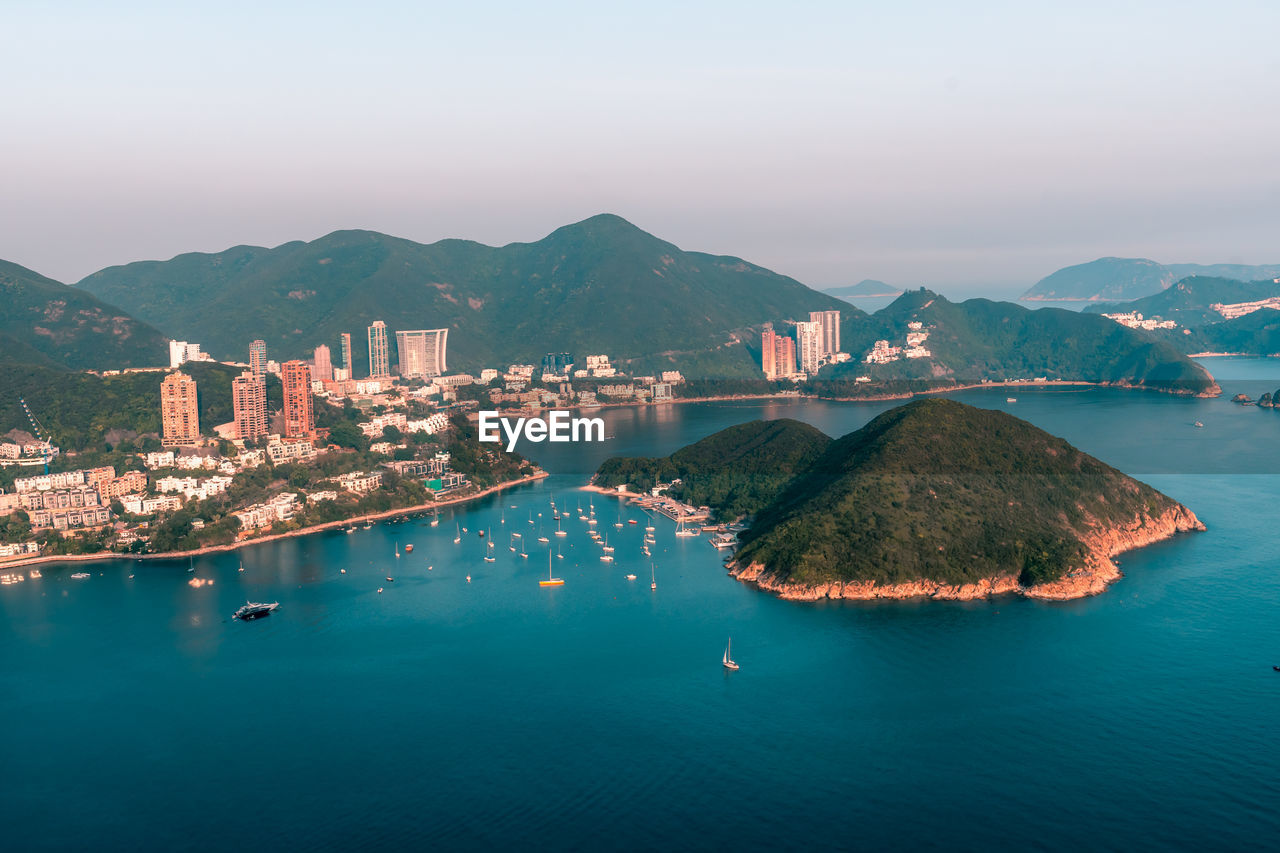 View of middle islands buildings in seaside at deep water bay hong kong seen form nam long shan