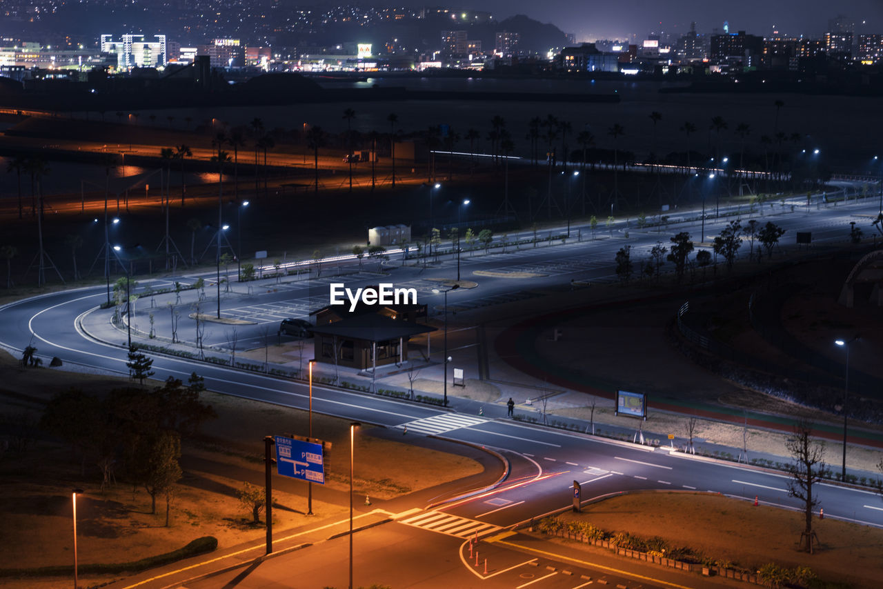 High angle view of light trails on road at night