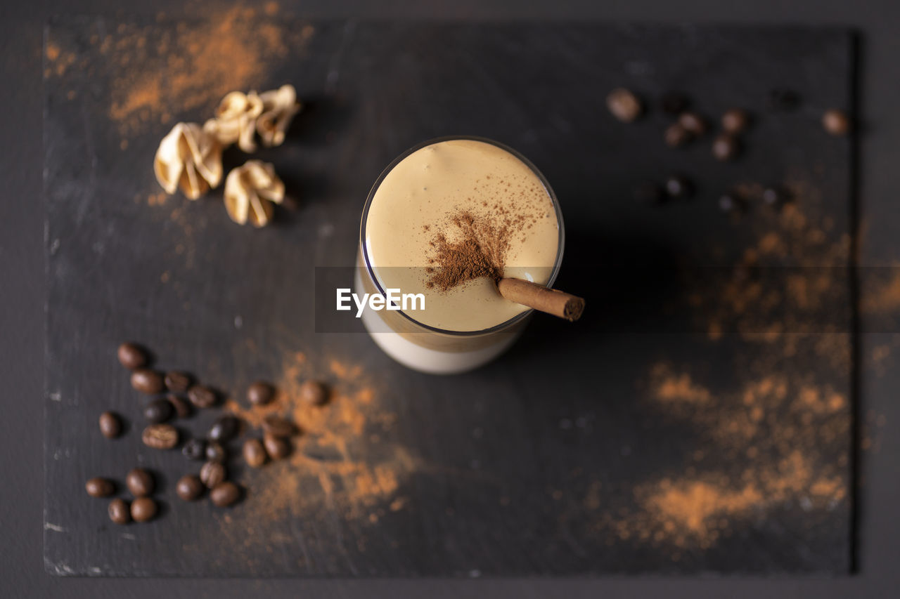 HIGH ANGLE VIEW OF COFFEE CUP AND CAKE