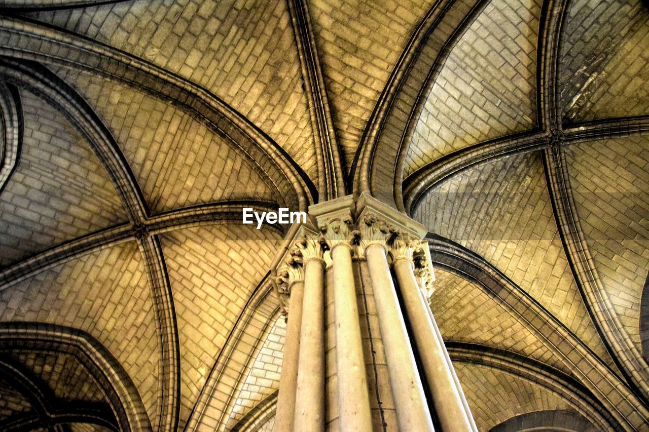 Low angle view of church ceiling