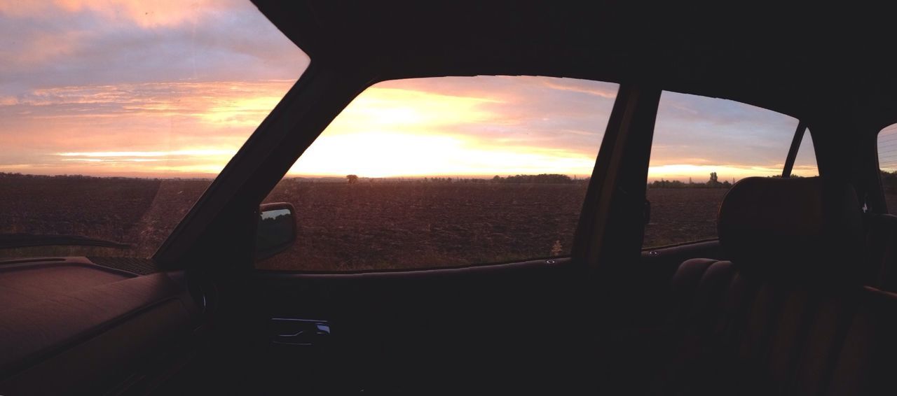 SCENIC VIEW OF SUNSET OVER LANDSCAPE