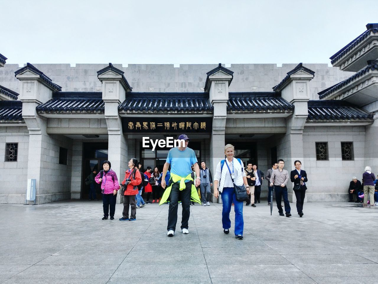 TOURISTS IN A BUILDING