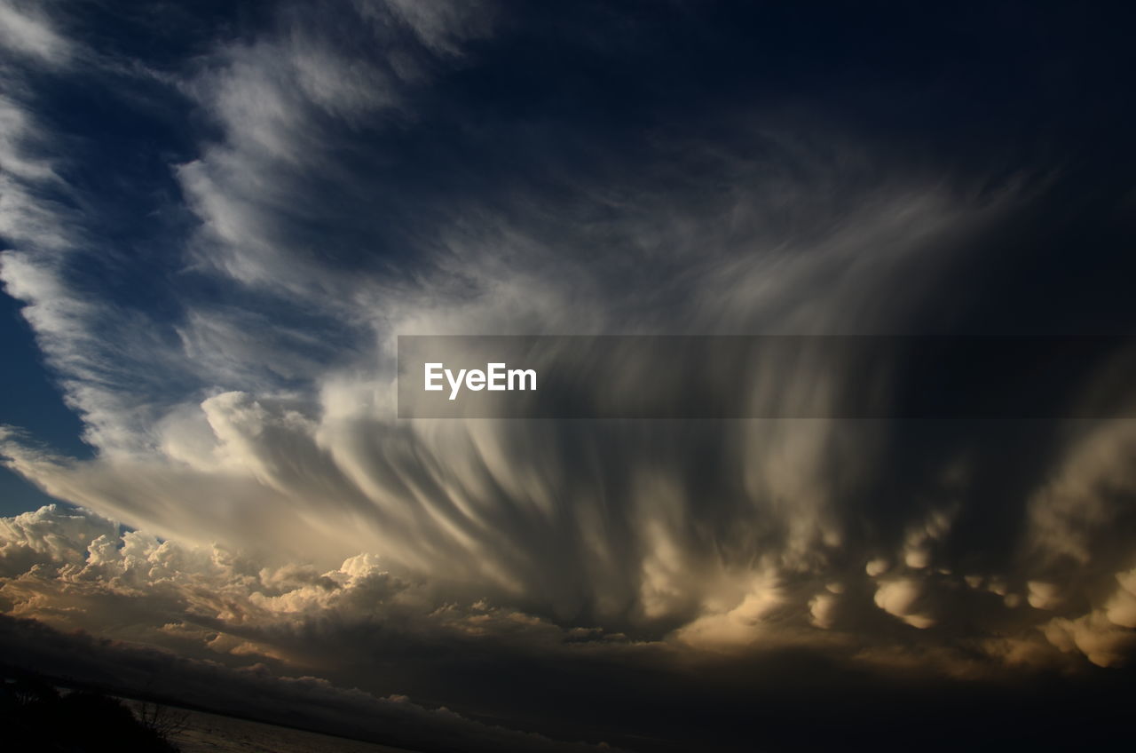 Storm clouds over landscape