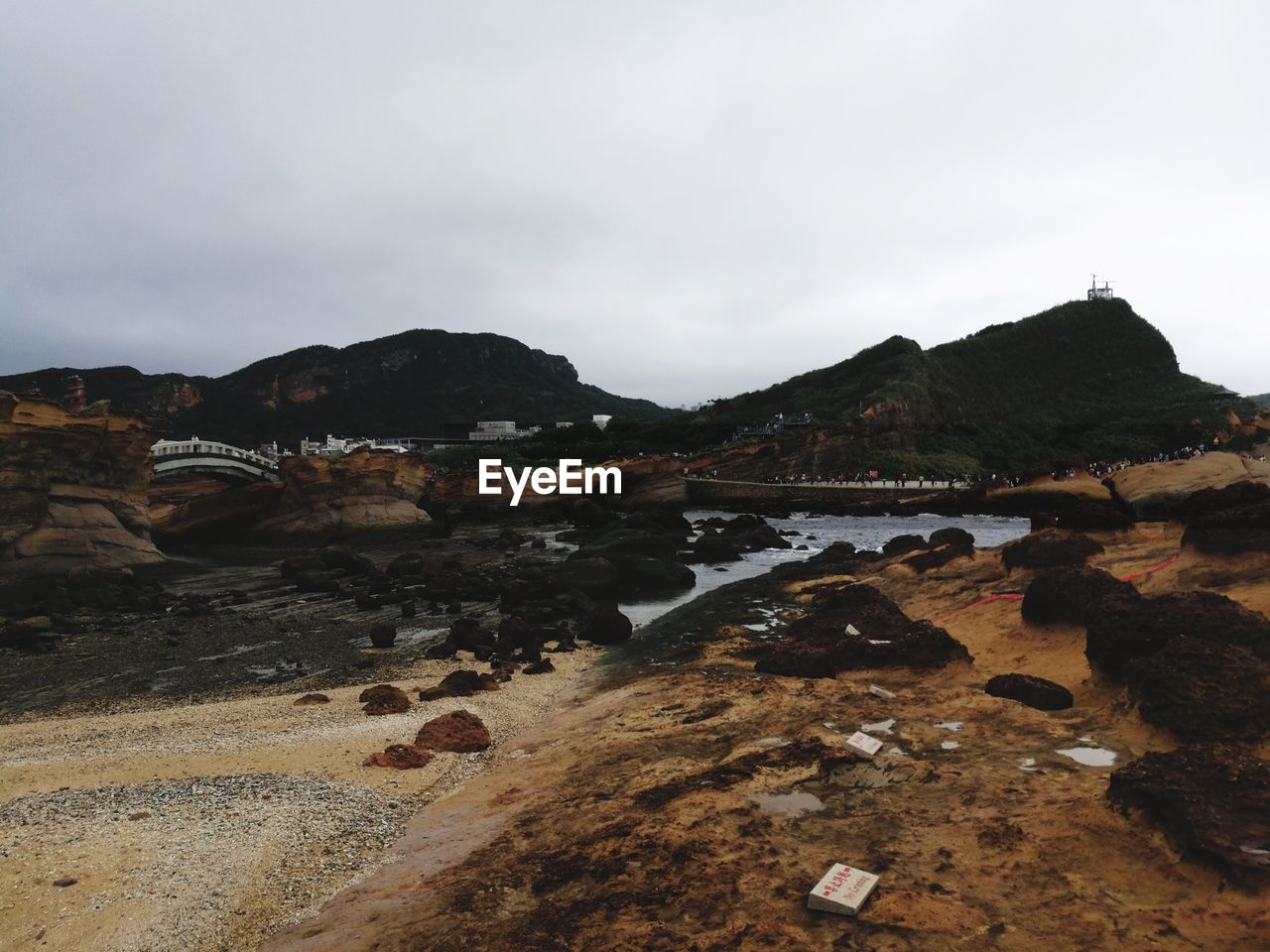 Scenic view of land against sky