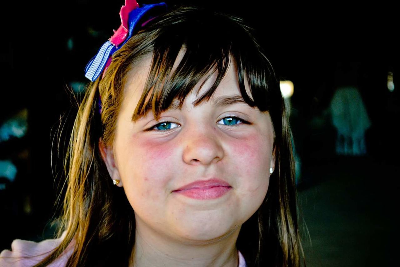 CLOSE-UP PORTRAIT OF CUTE GIRL