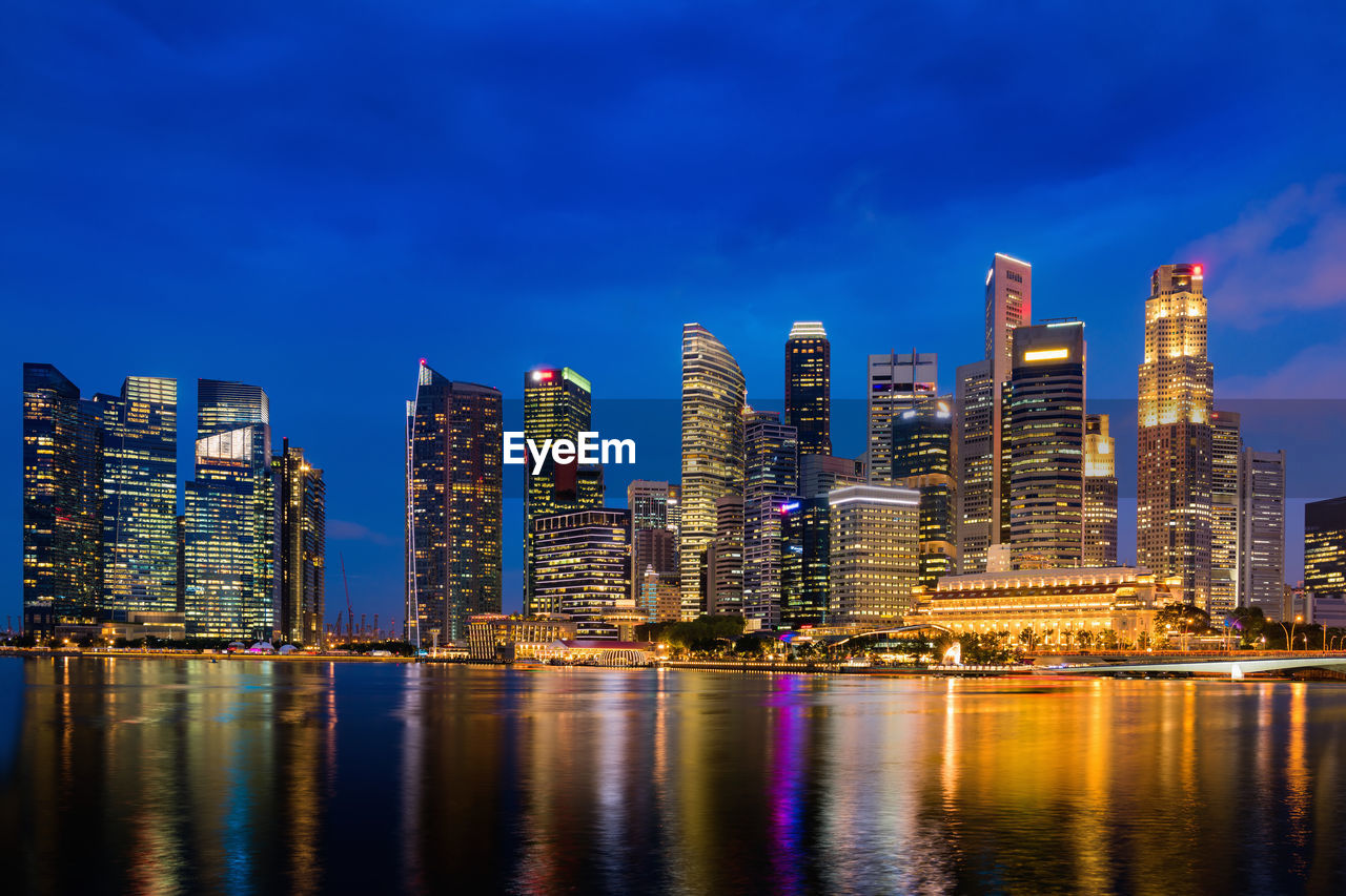 Illuminated buildings in city at night