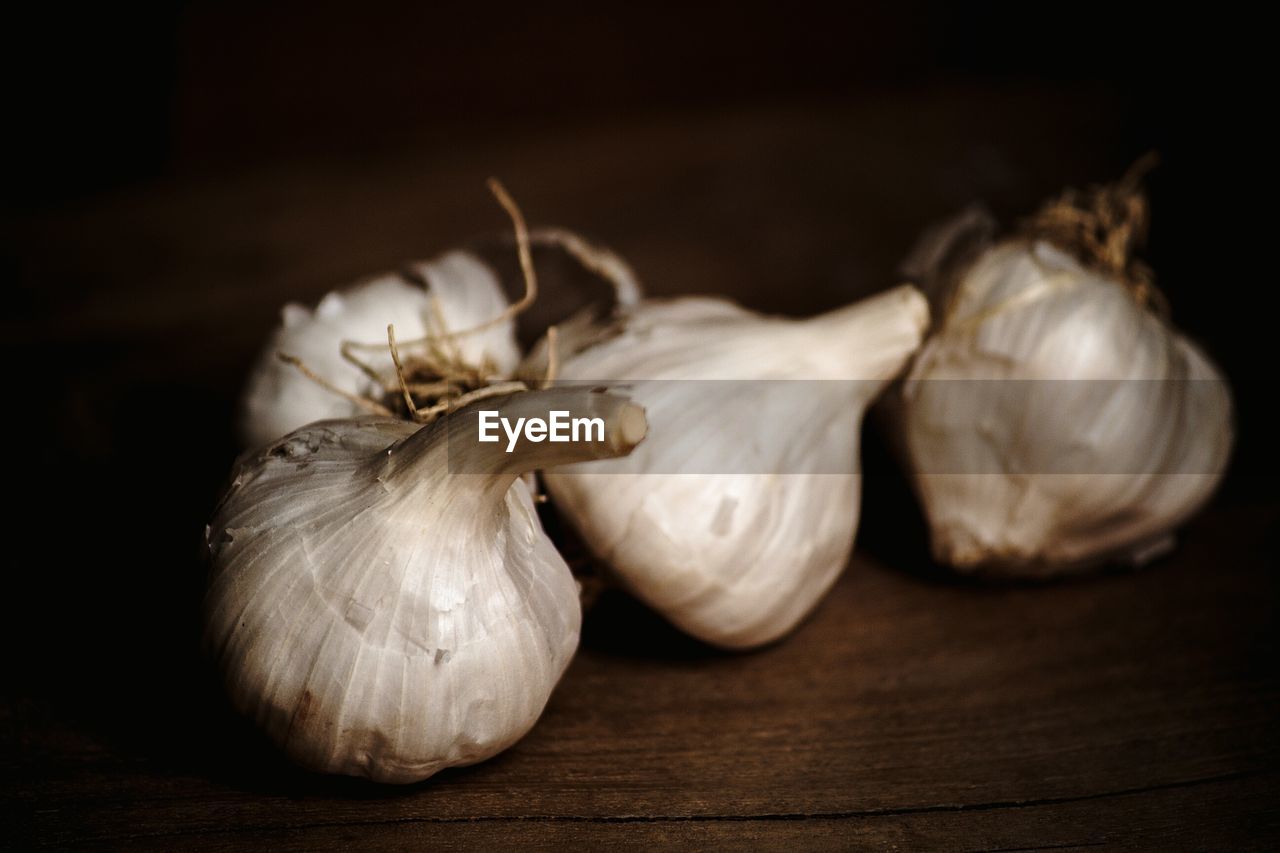 Close-up of garlic on table