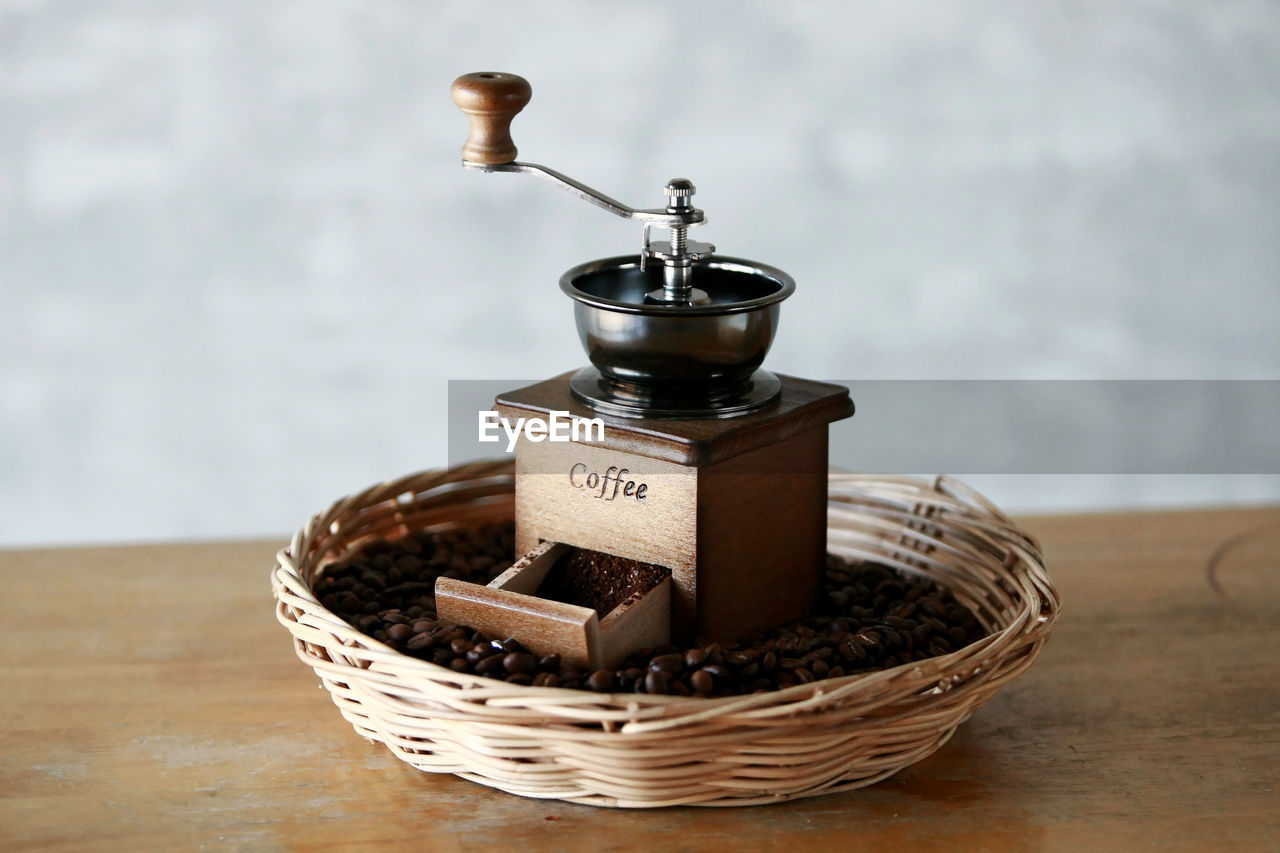 food and drink, container, food, iron, no people, indoors, basket, wood, focus on foreground, table, freshness, still life