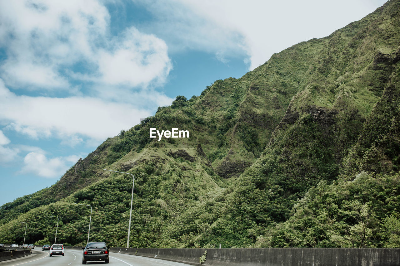 SCENIC VIEW OF MOUNTAIN AGAINST SKY