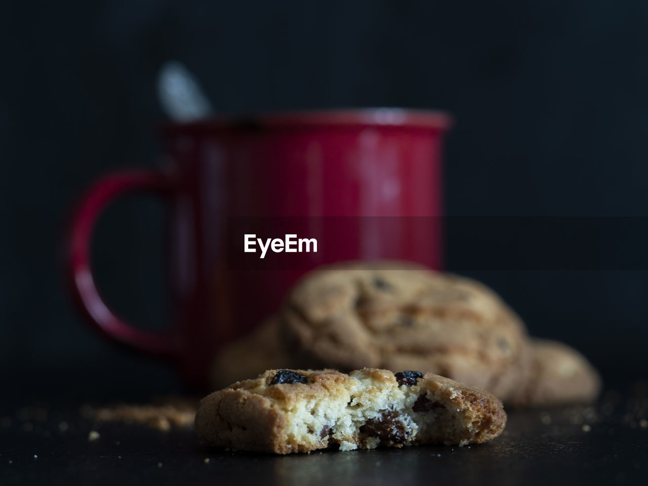 CLOSE-UP OF COOKIES ON TABLE DURING SUNSET