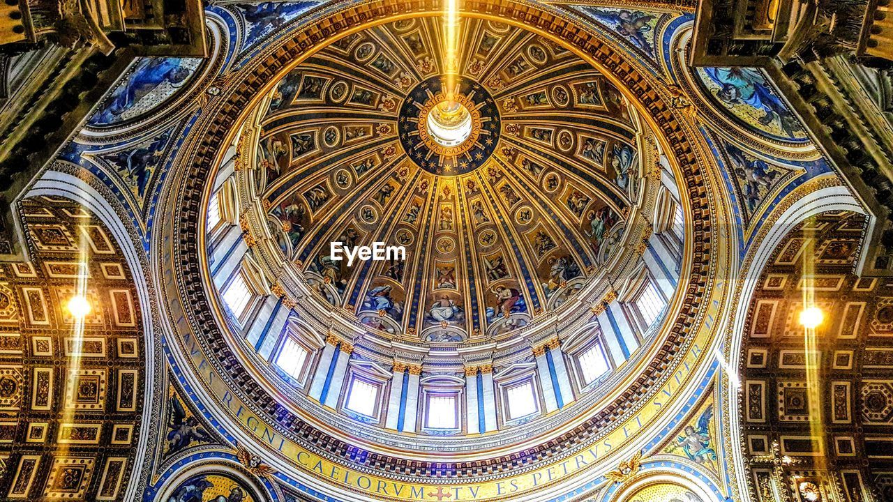 Low angle view of illuminated ceiling