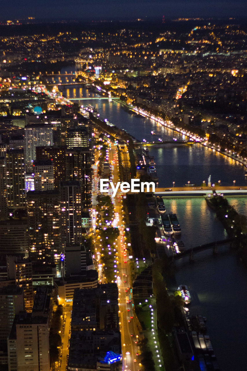 Aerial view of illuminated cityscape at night