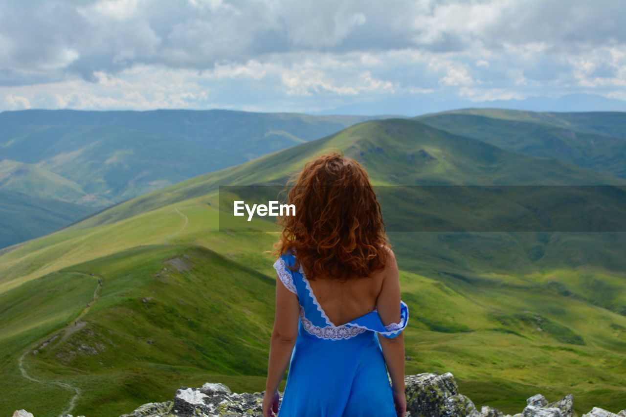 Woman looking at mountains