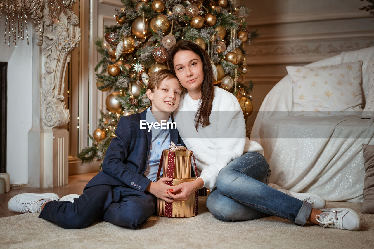 Christmas portrait of a mother and son.