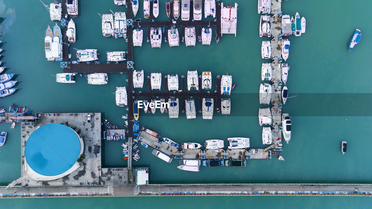 High angle view of commercial dock against sea