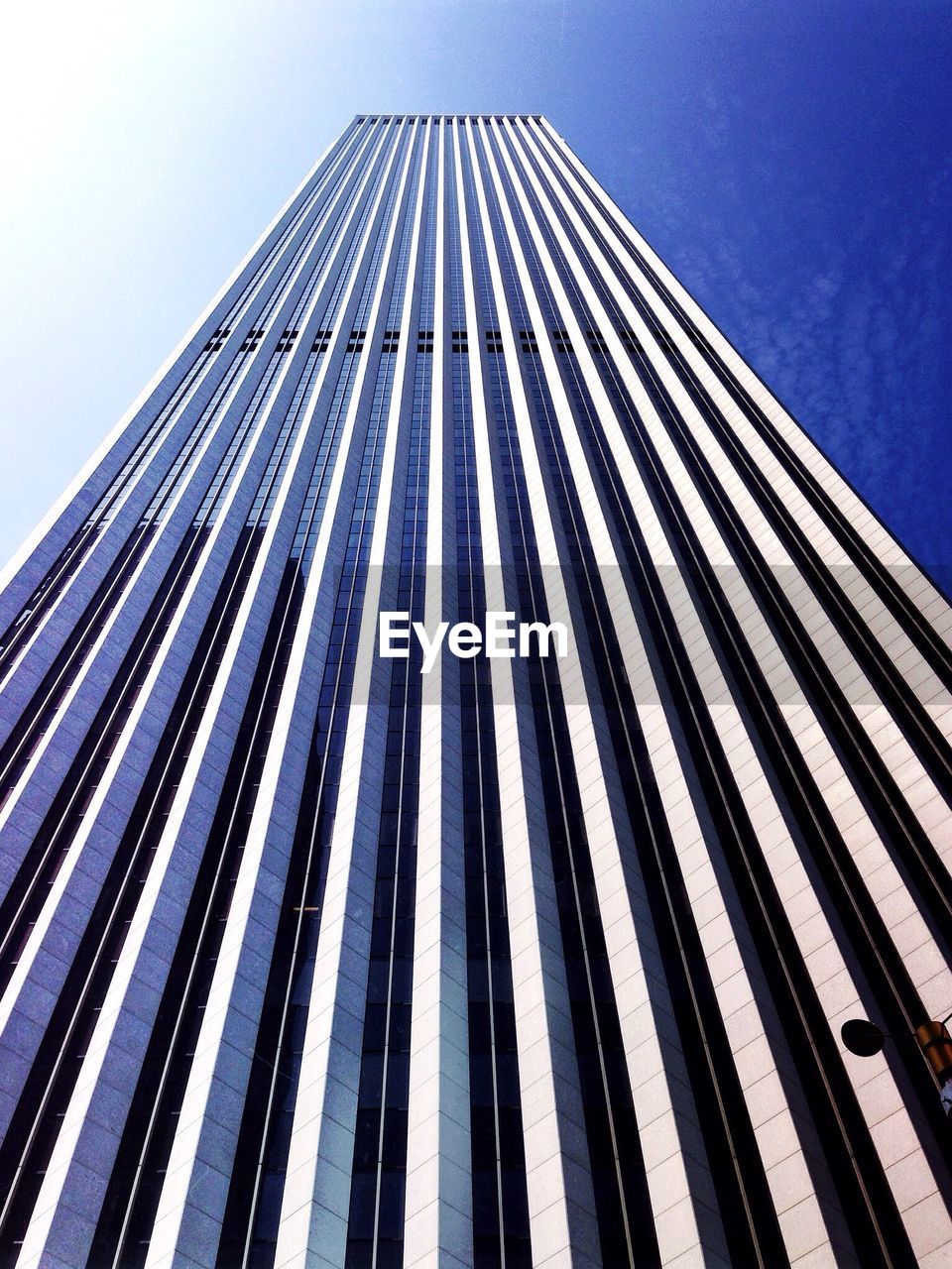 Low angle view of modern building against sky in city