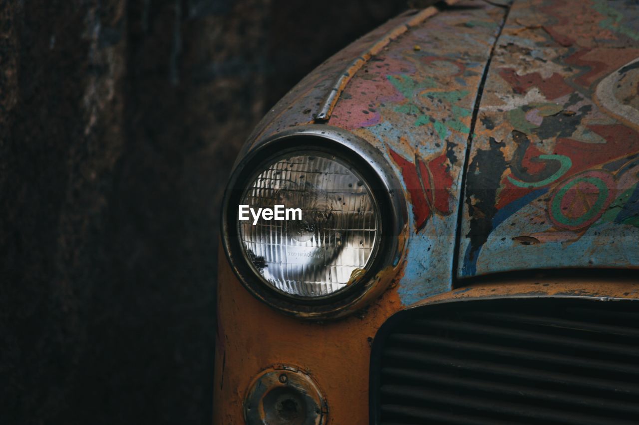 Close-up of abandoned car