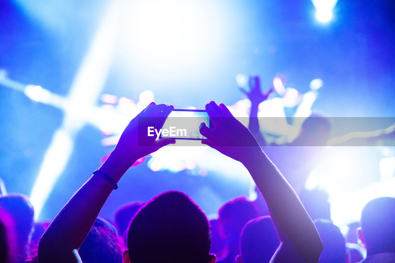 Group of people at music concert