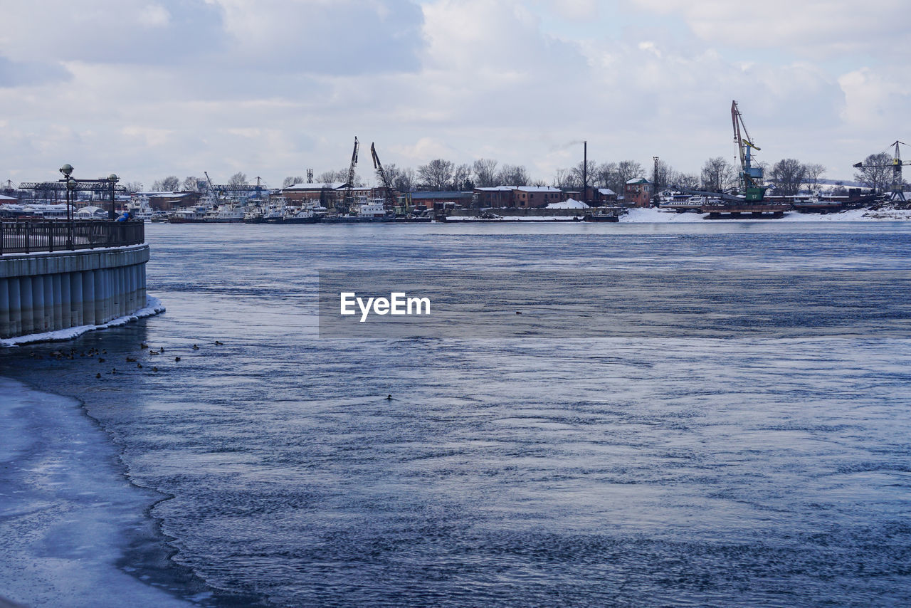 Scenic view of sea against sky during winter