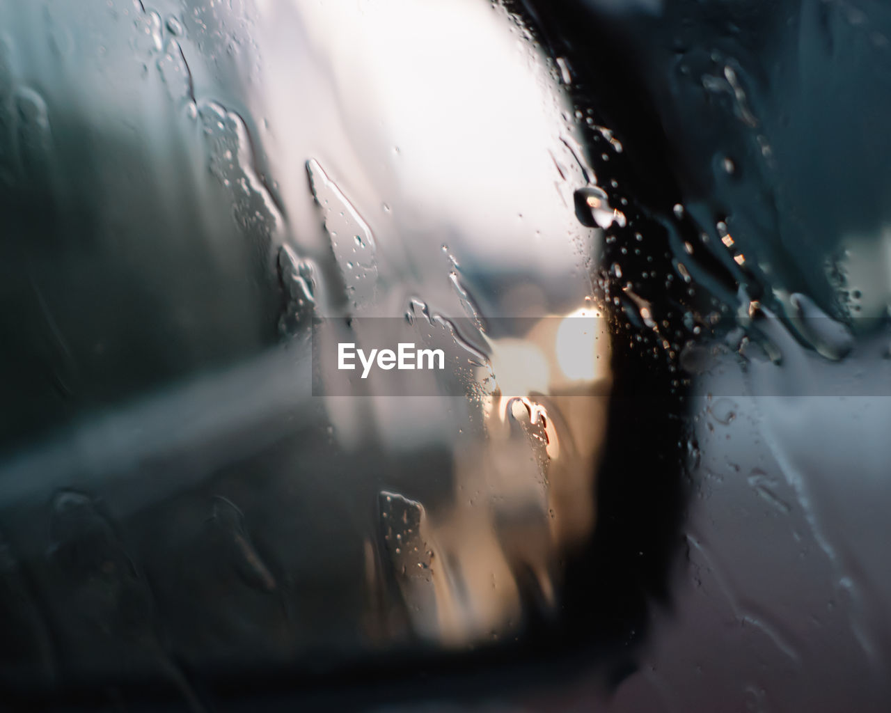 Close-up of wet car window