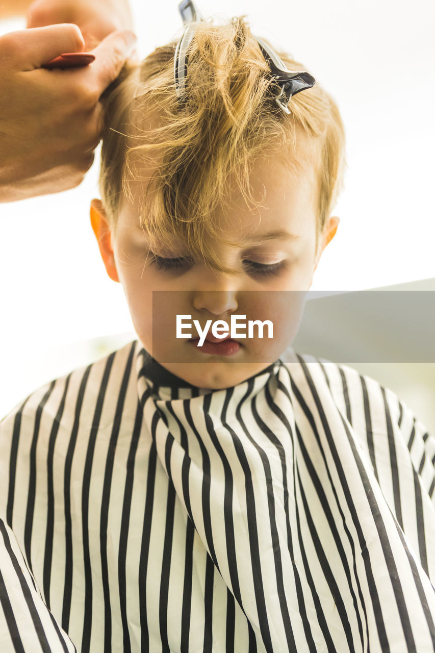 Boy getting haircut