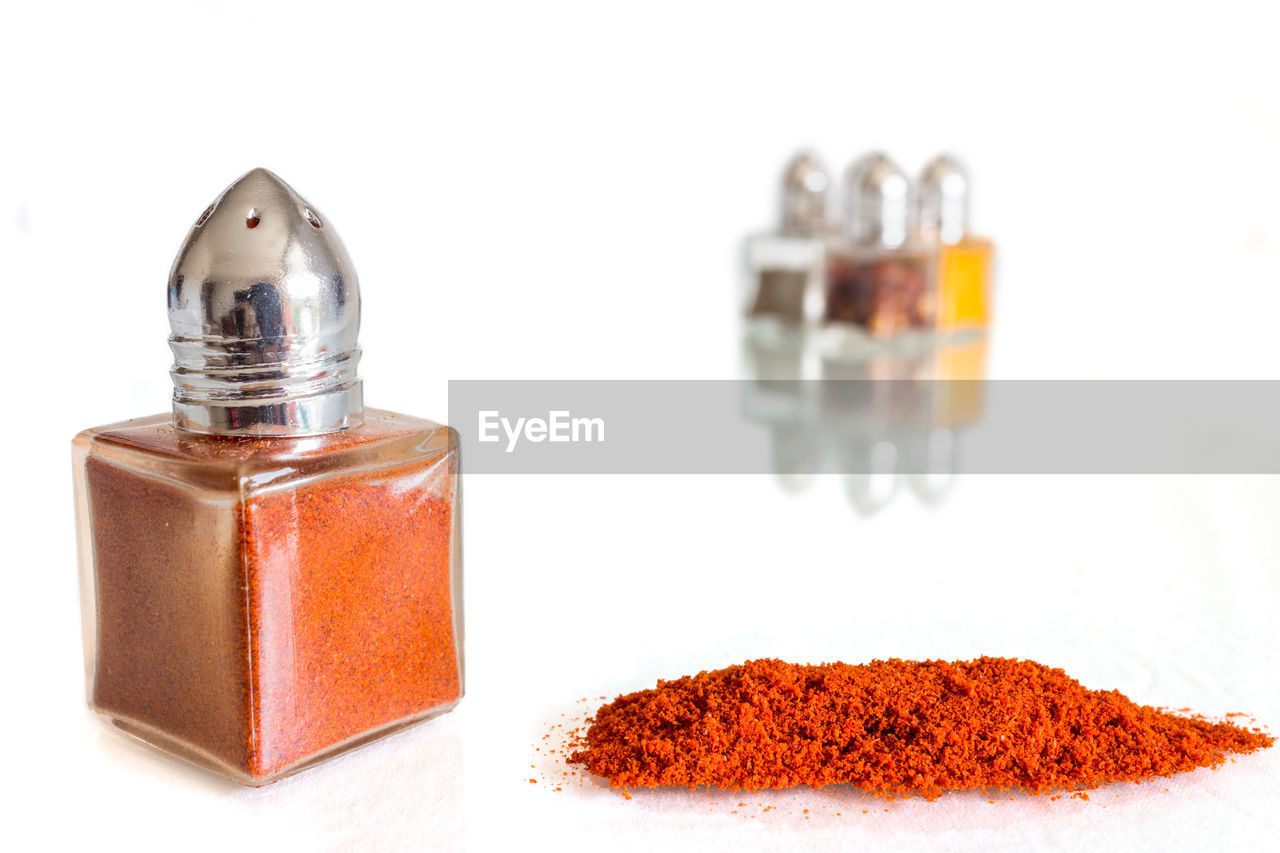 Close-up of spices on white background
