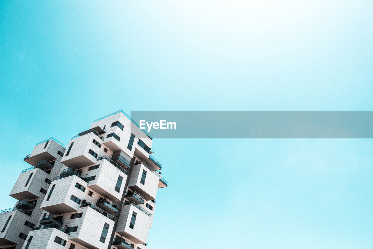 Low angle view of buildings against clear sky