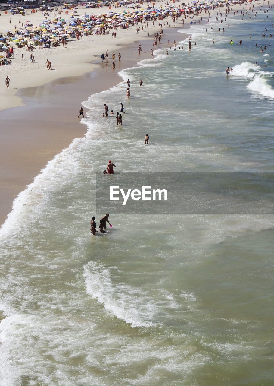 People enjoying at beach