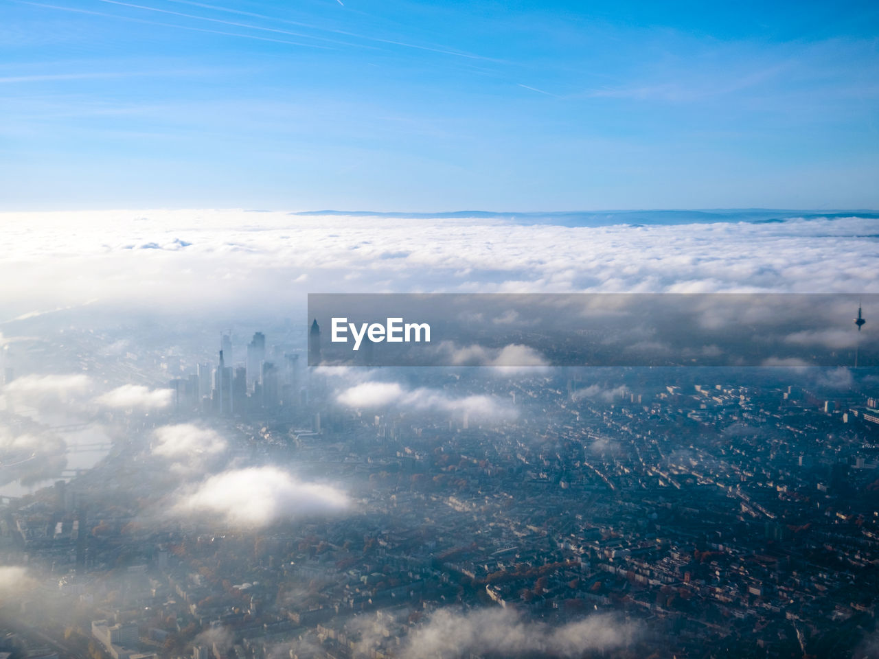 Aerial view of cityscape against sky