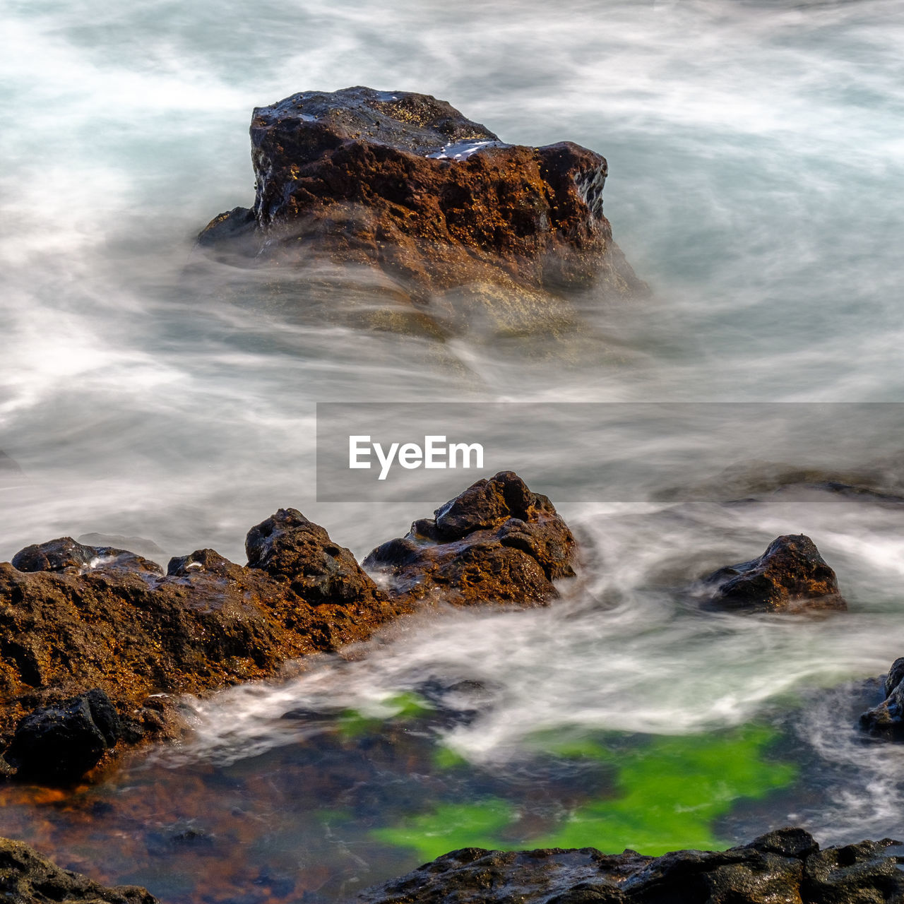 Scenic view of rock formation in sea