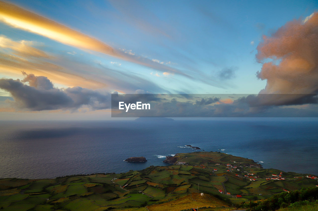 SCENIC VIEW OF SEA DURING SUNSET