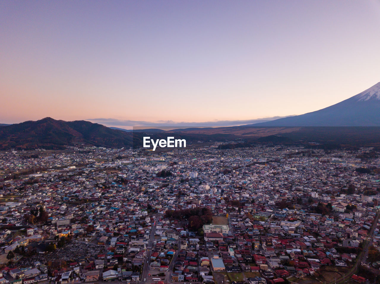 High angle view of townscape against sky during sunset